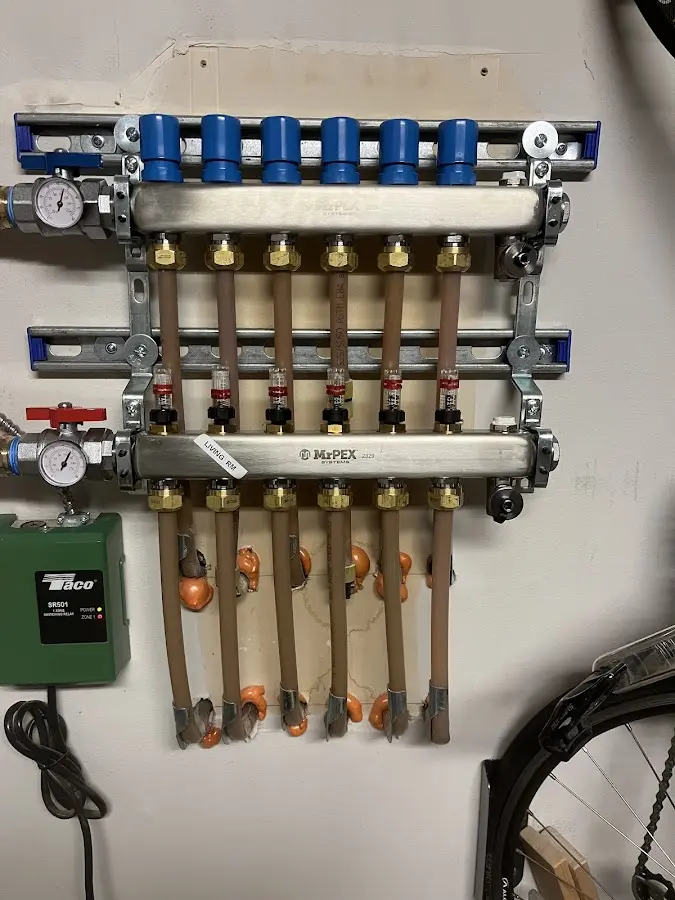 Plumber performing Water Heater Repair at a residential property in Yeadon